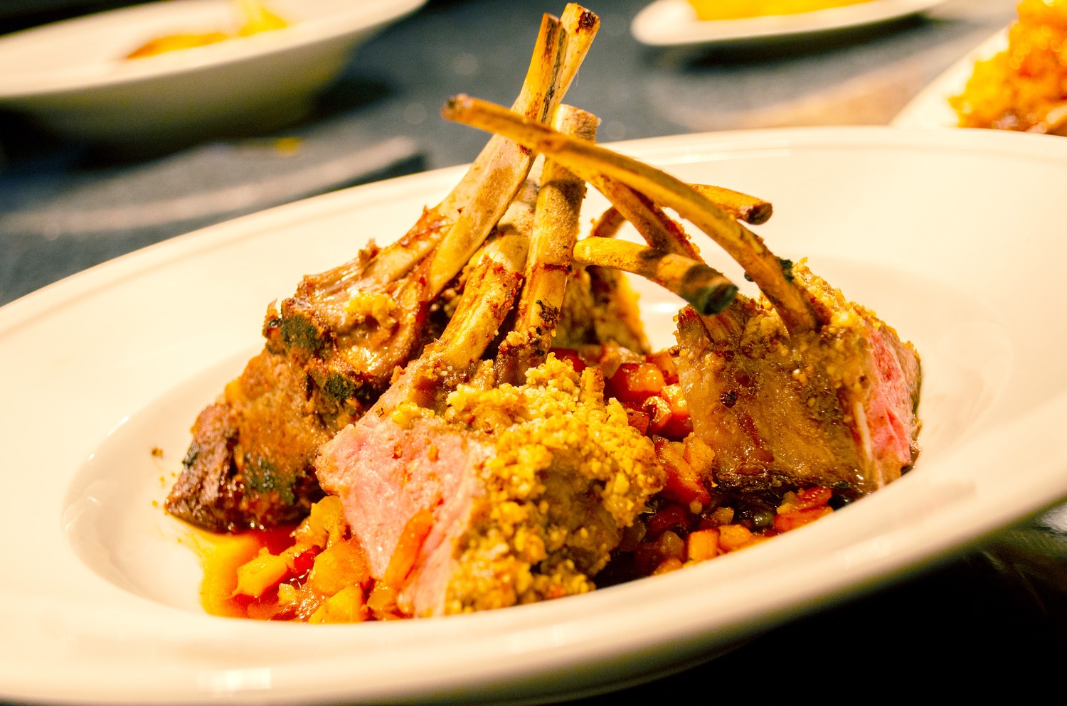 The Pointe - Plate of lamb on top bed of veggies