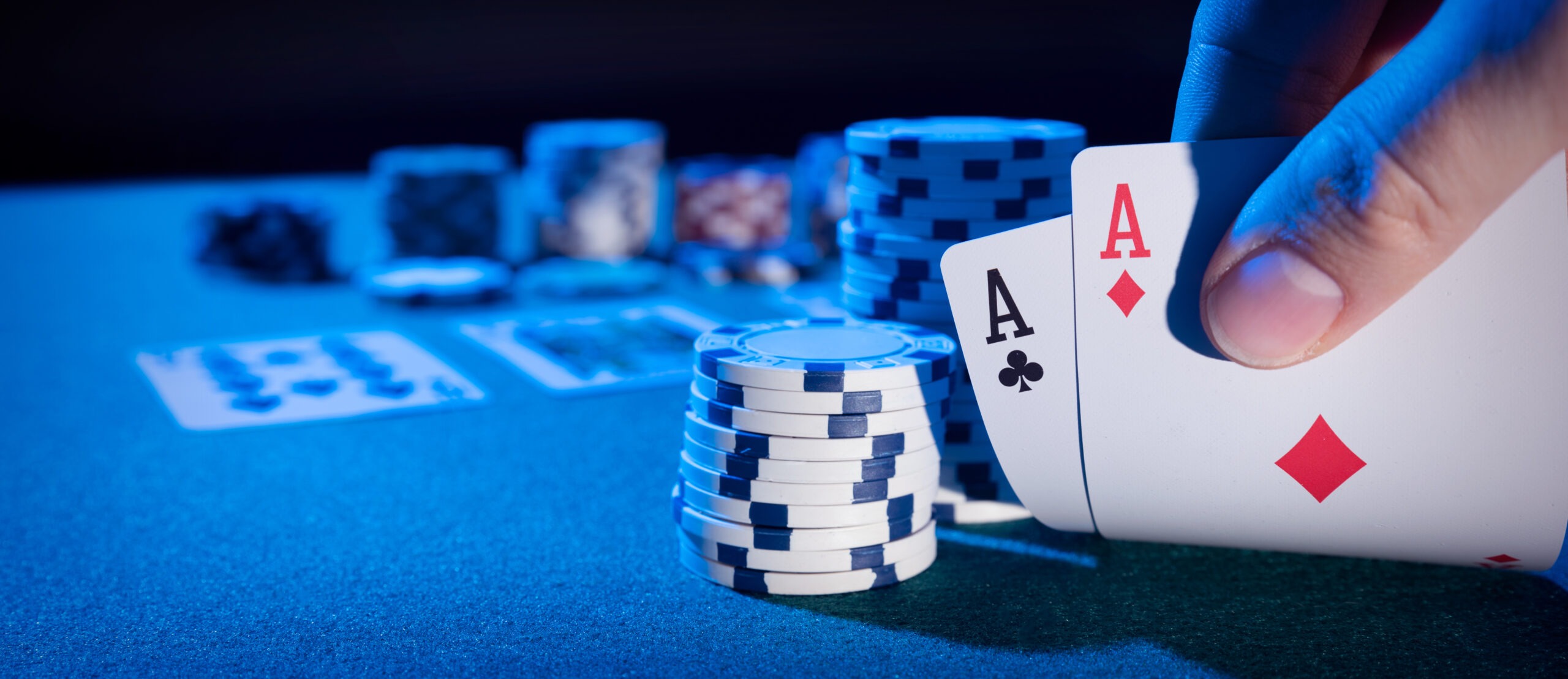 Man plays poker in the casino